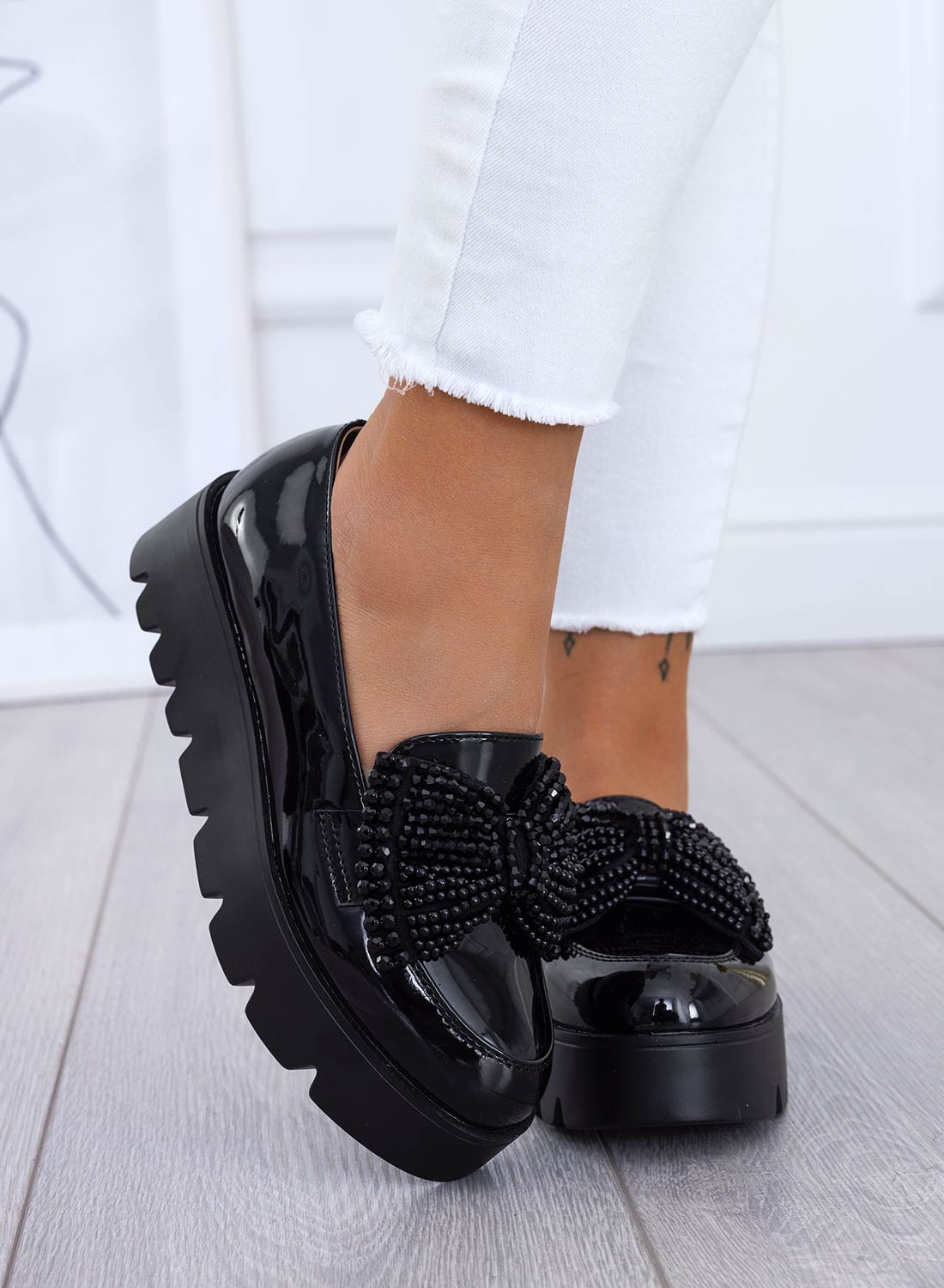 Black patent loafers with rhinestone bow