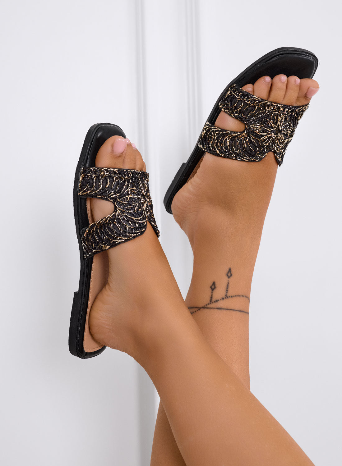EUGENIA - Black slide sandals with gold embroidery and cut-out band