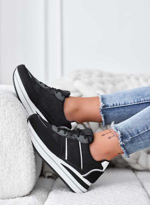 Black sneakers with glitter inserts