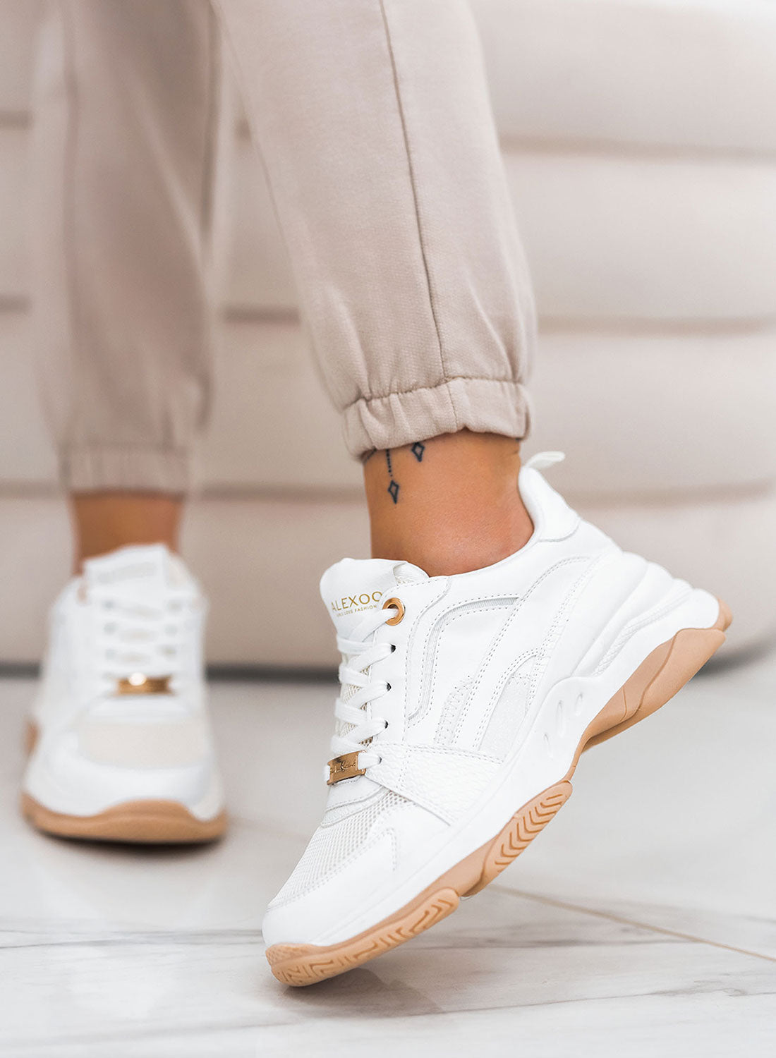 White perforated Alexoo sneakers