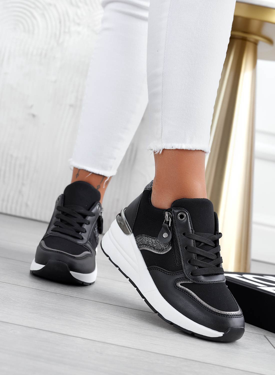 Black sneakers with glitter inserts