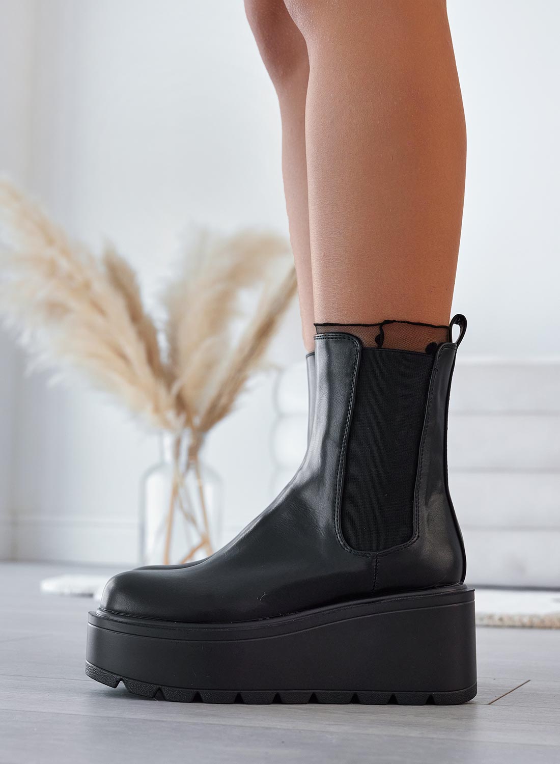 Bottines Alexoo noires avec semelle compensée et élastique latéral