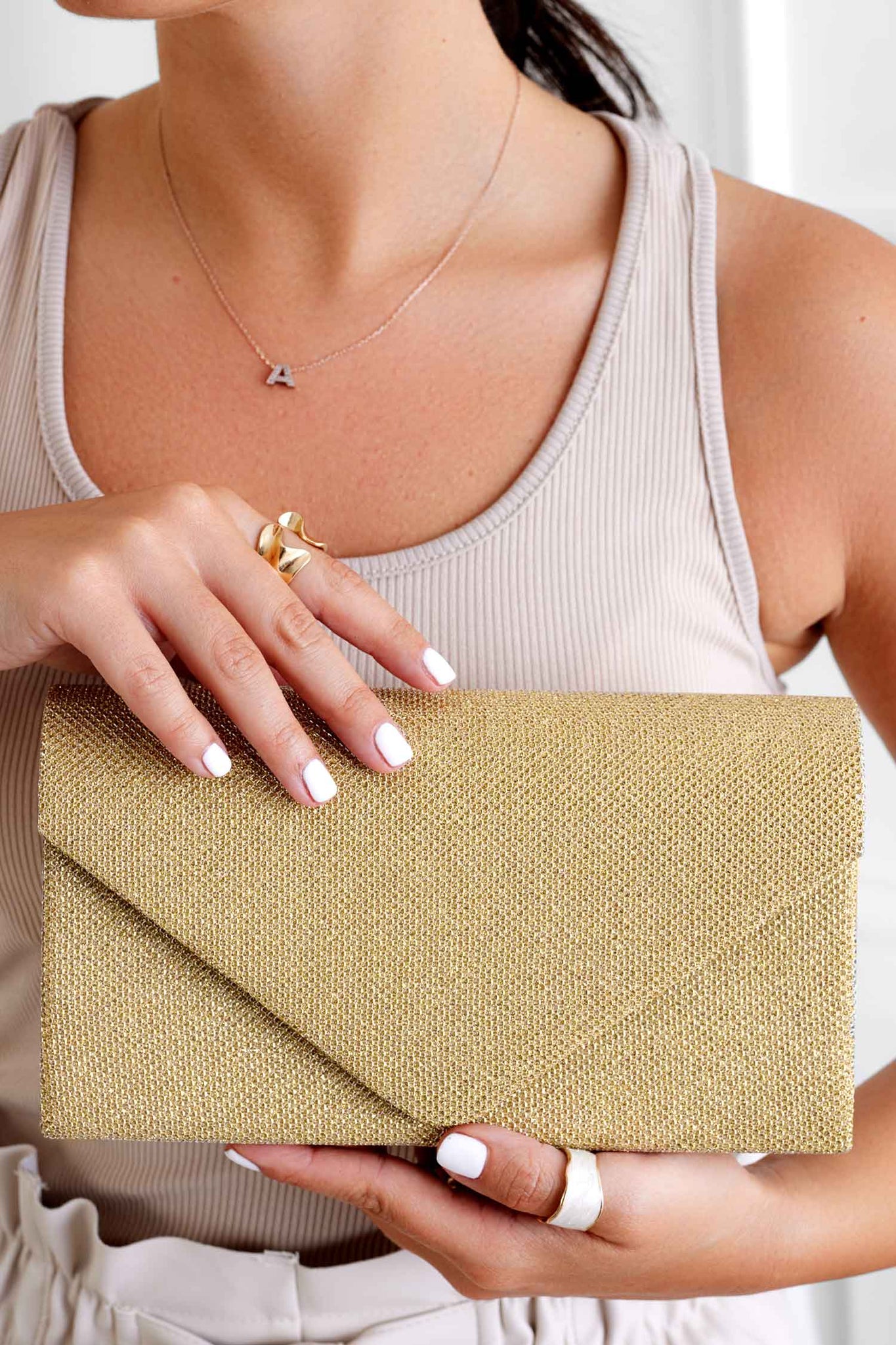B221 gold glitter clutch bag