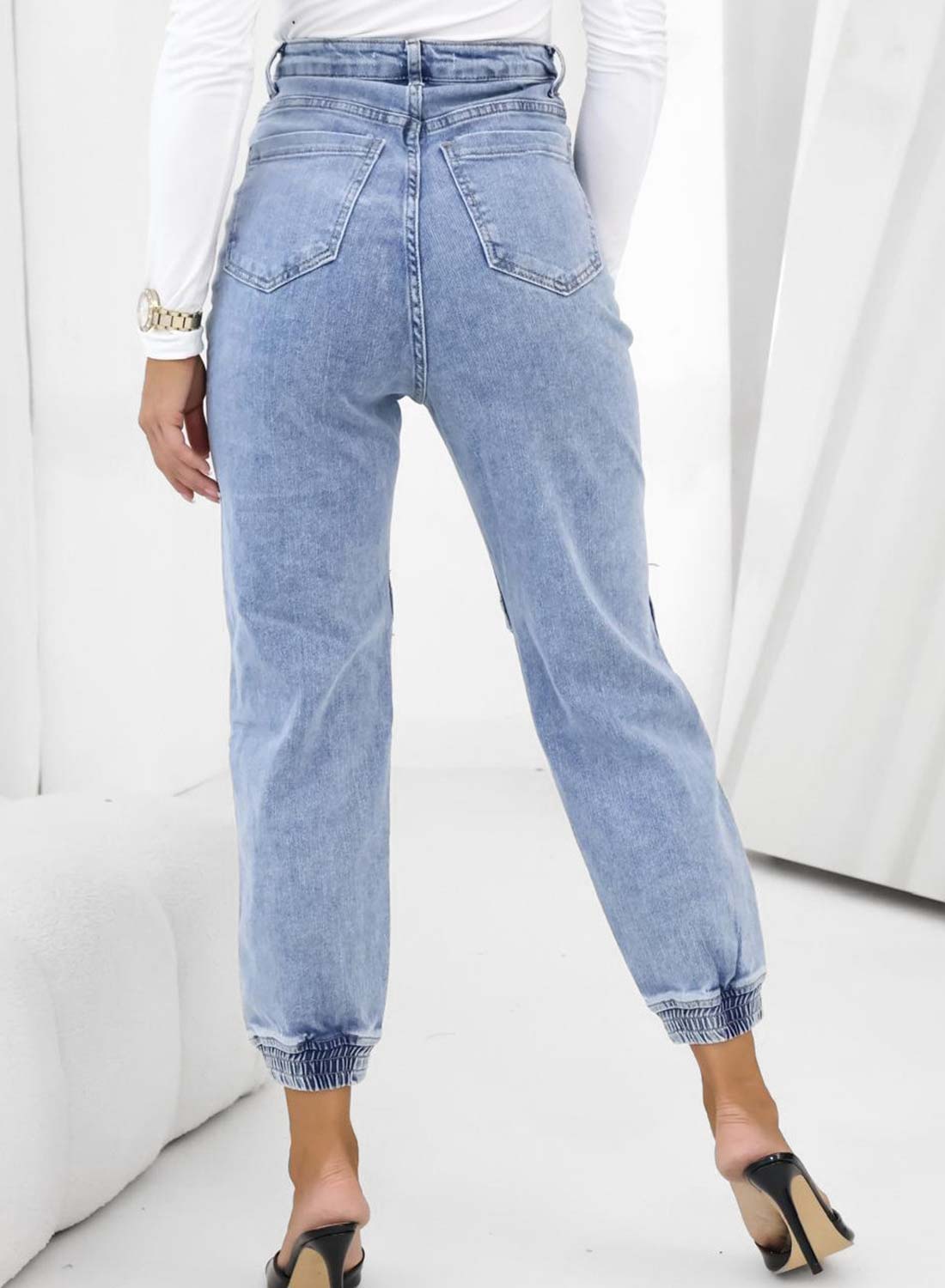 Pantalone jeans blu con apertura e zip