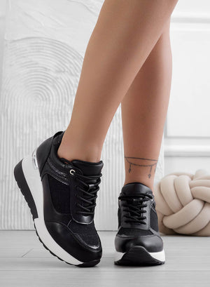 Black sneakers with glitter fabric inserts