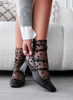 Black slingback Mary Jane pumps