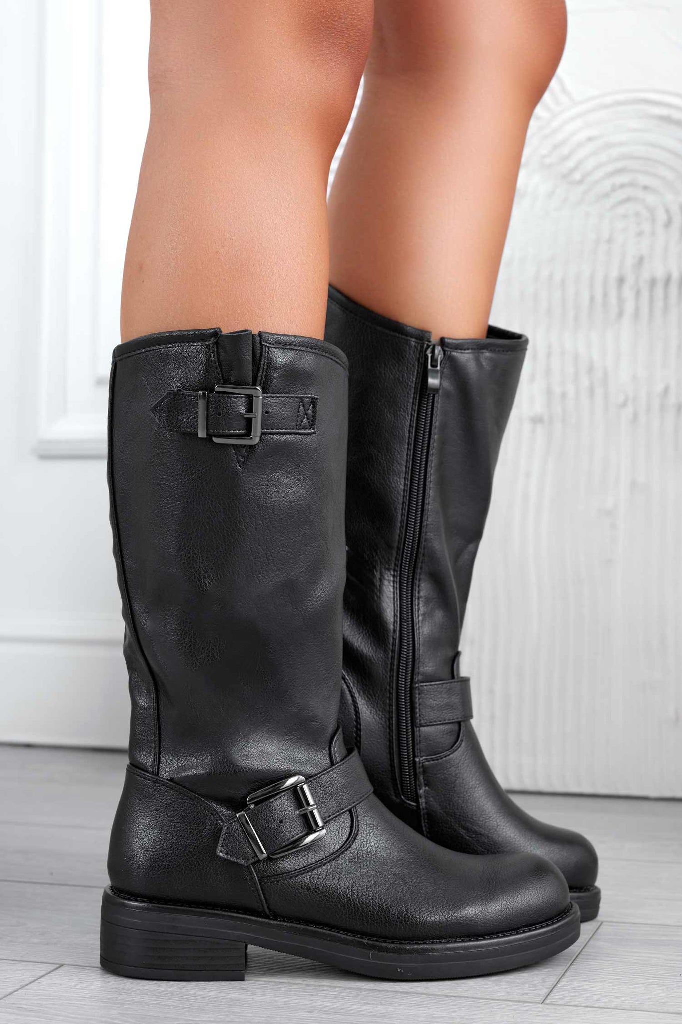 Black ankle boots with buckles