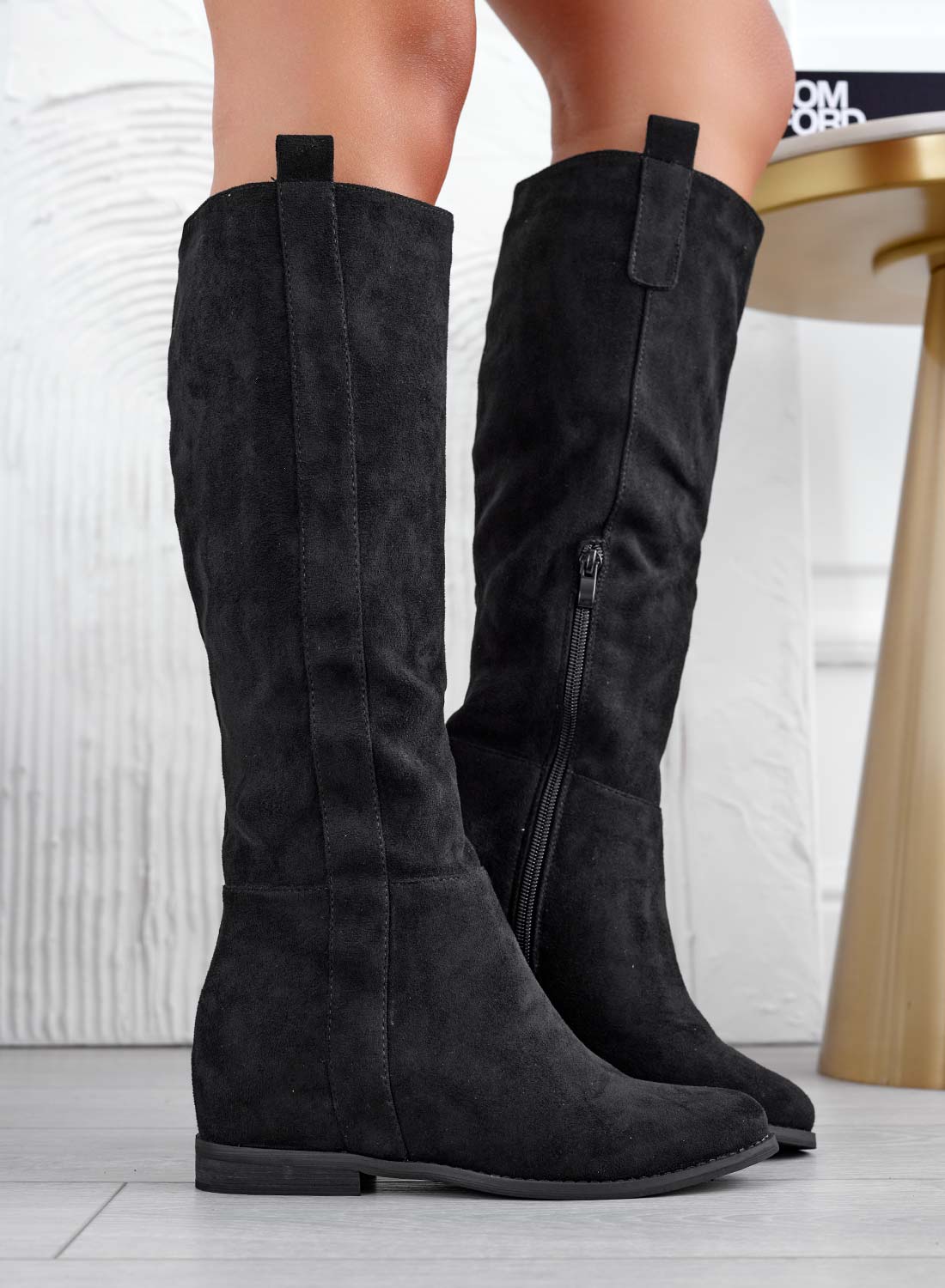 Black suede boots with internal wedge