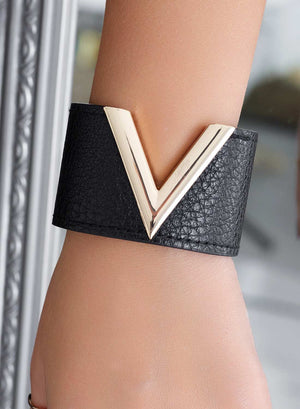 Black bracelet with gold V