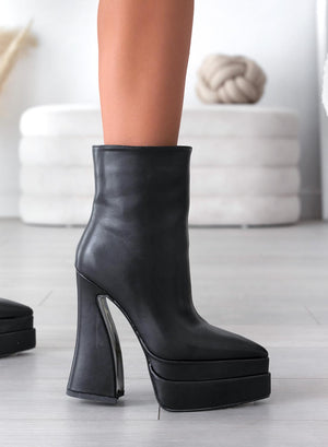 Black Alexoo ankle boots with pointed toe and curved heel
