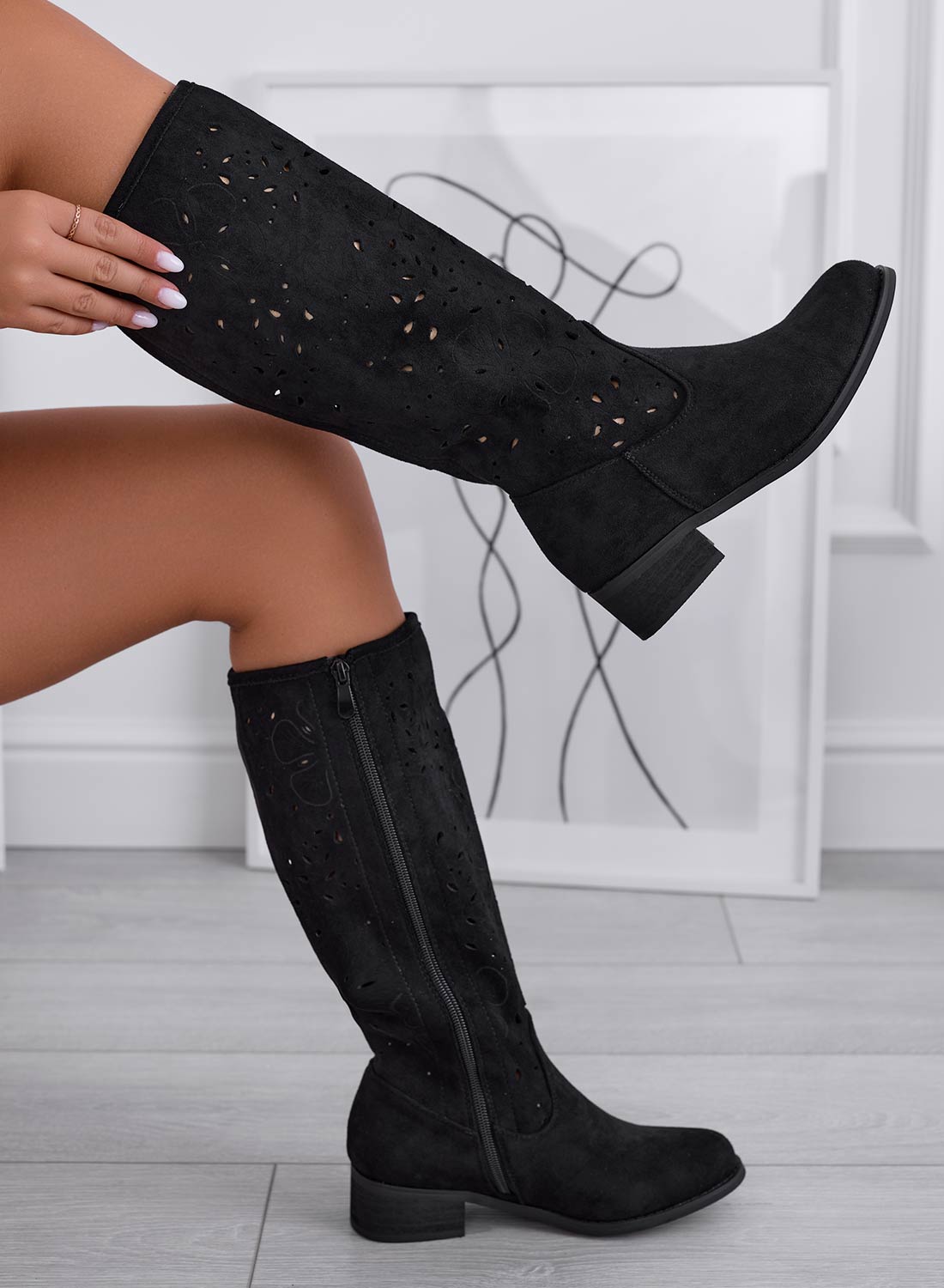 Black perforated suede mid-calf boots