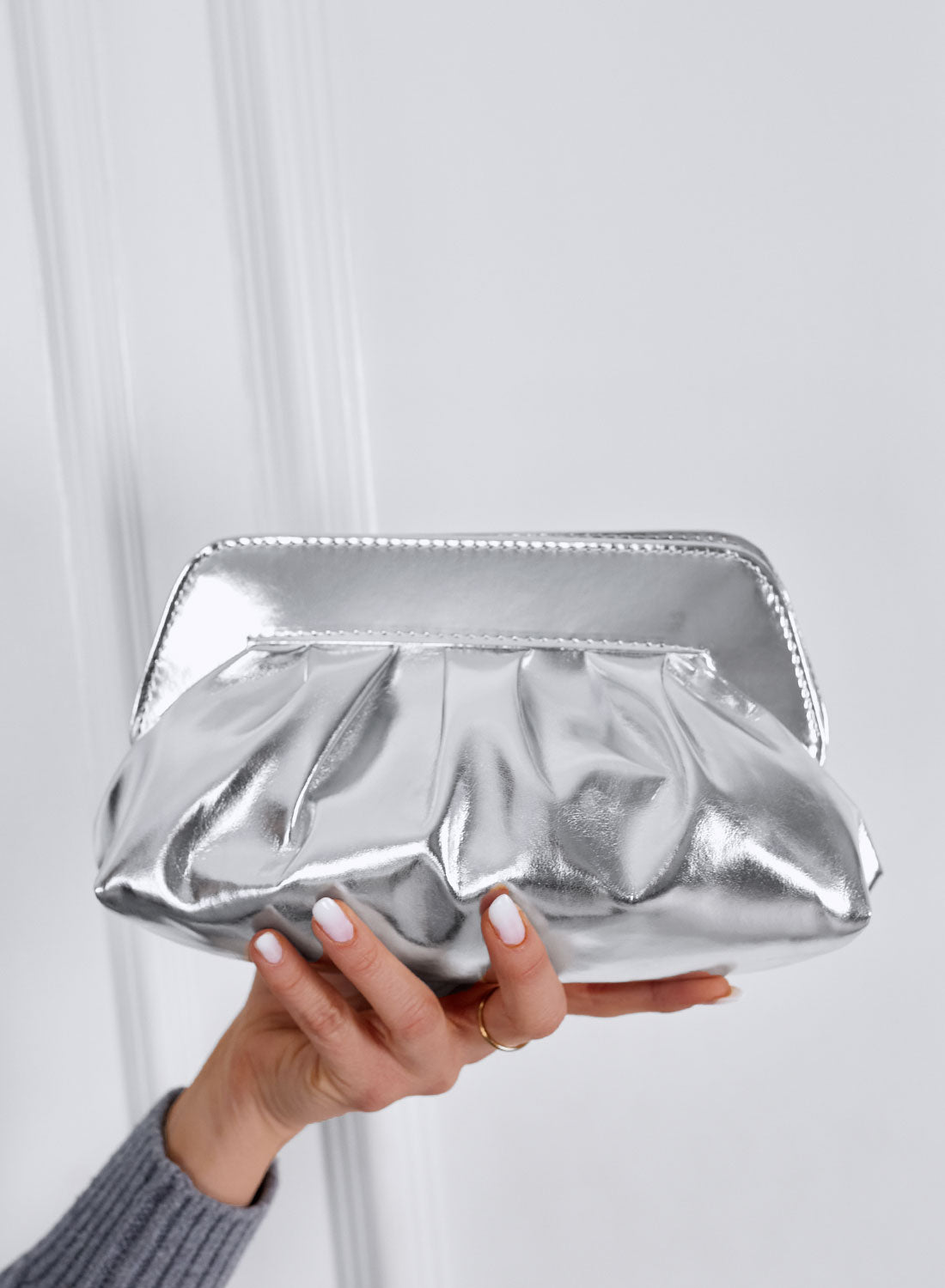 Silver eco-leather clutch bag with chain
