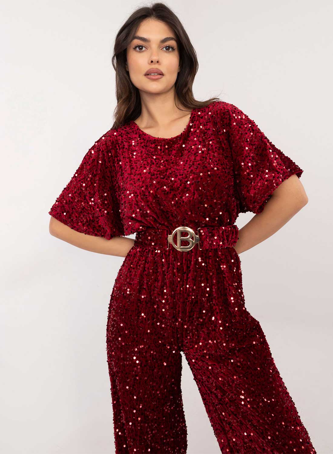 Tuta bordeaux in paillettes con cintura in vita