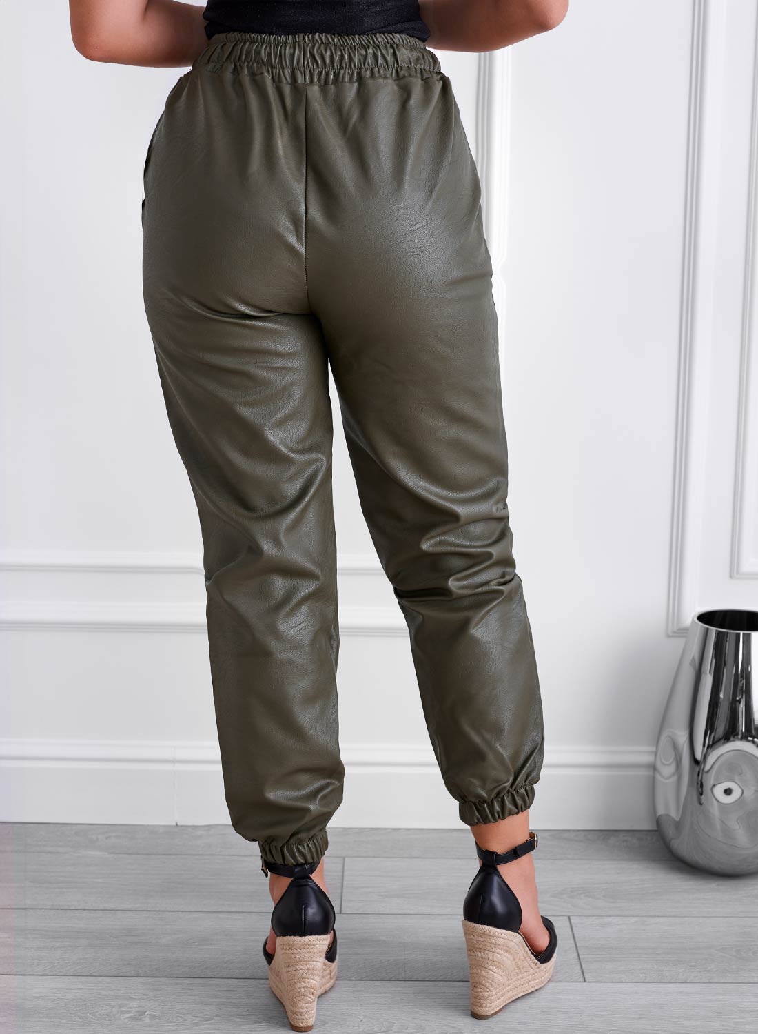 Green faux leather trousers with elastic and drawstring waist