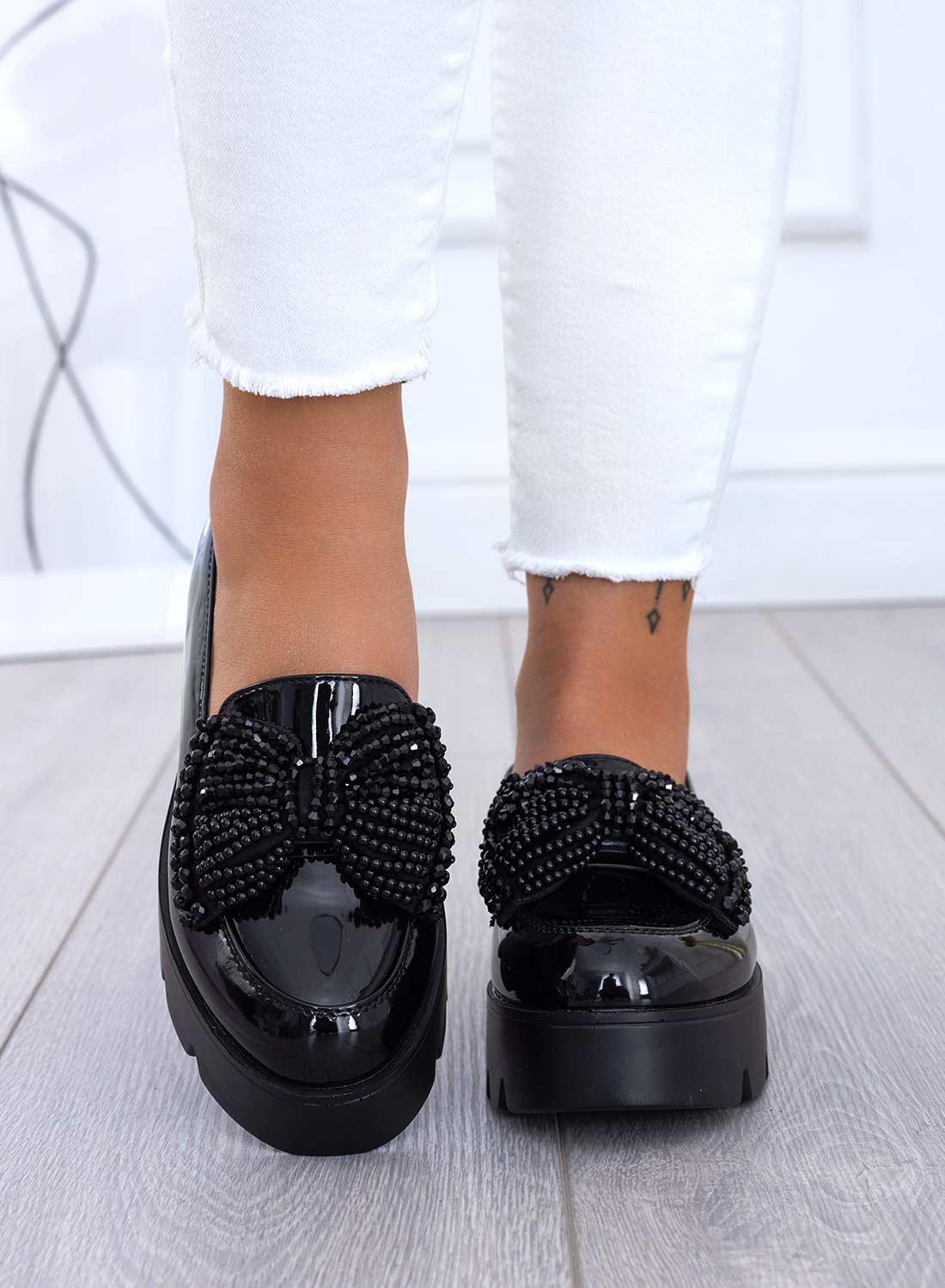 Black patent loafers with rhinestone bow