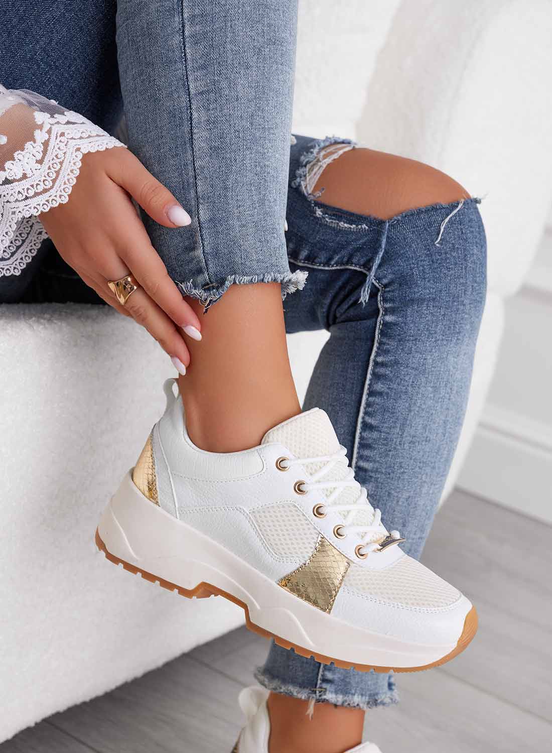 White perforated Alexoo sneakers with gold inserts