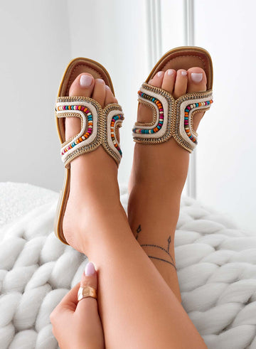 Beige slide sandals with multicolor stones