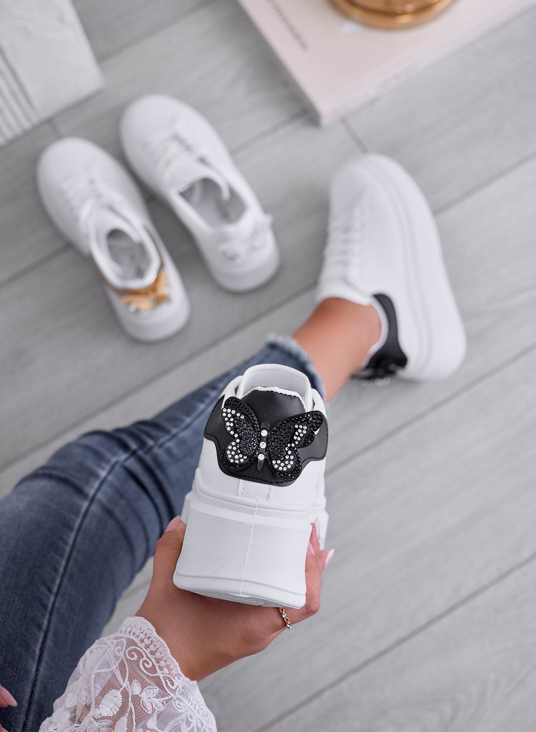 CRISTINA - White sneakers with black heel and jeweled butterfly