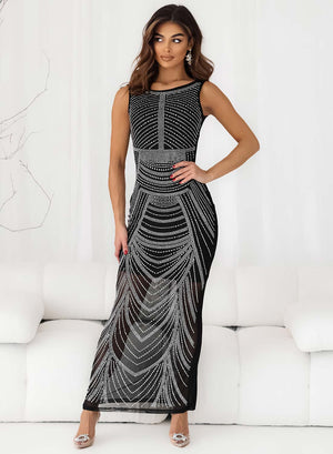 Long black dress embellished with rhinestones