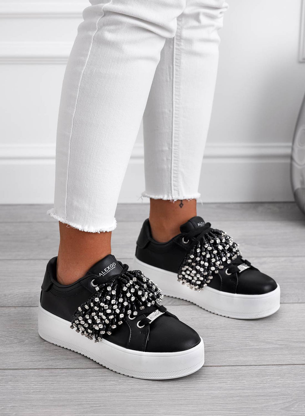 CARRY - Sneakers nere Alexoo con fascia in strass