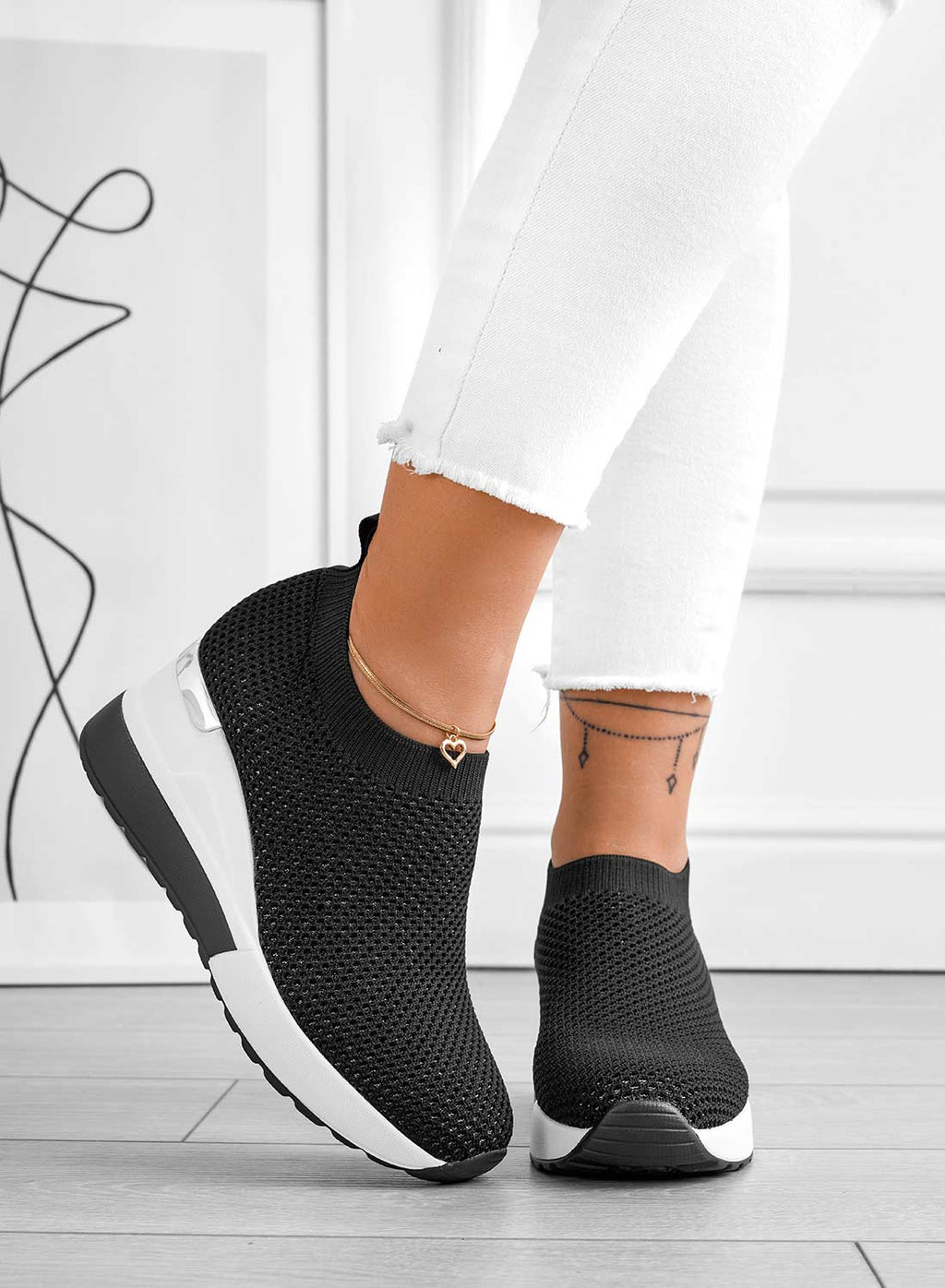 Sneakers nere in tessuto elastico