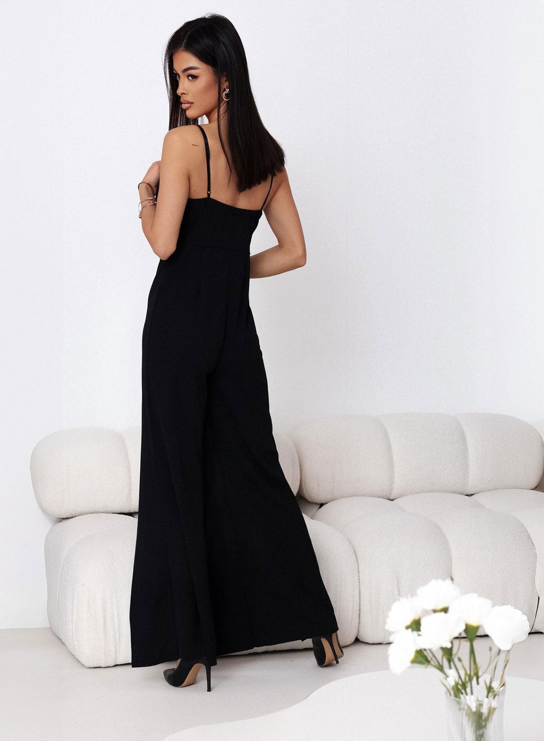Elegant black jumpsuit with leg slits