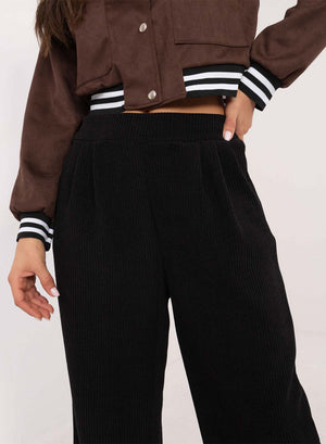 Black corduroy trousers