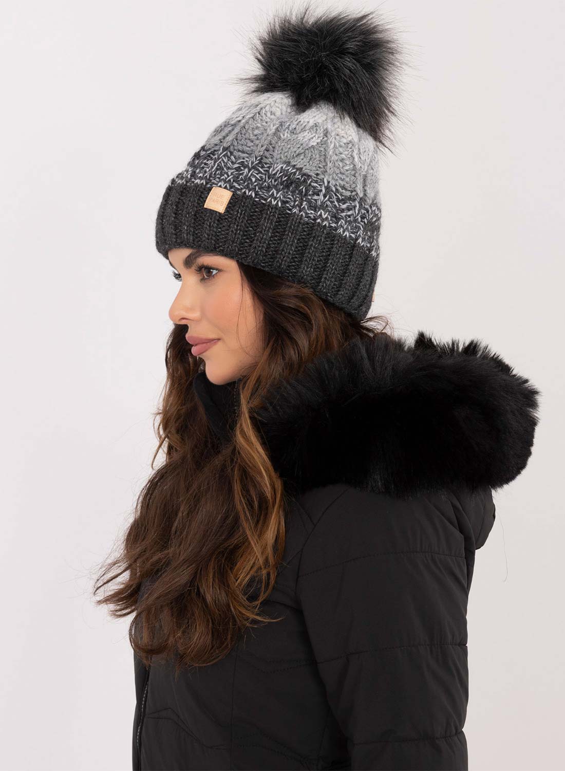 Gray hat with inner padding and pompom