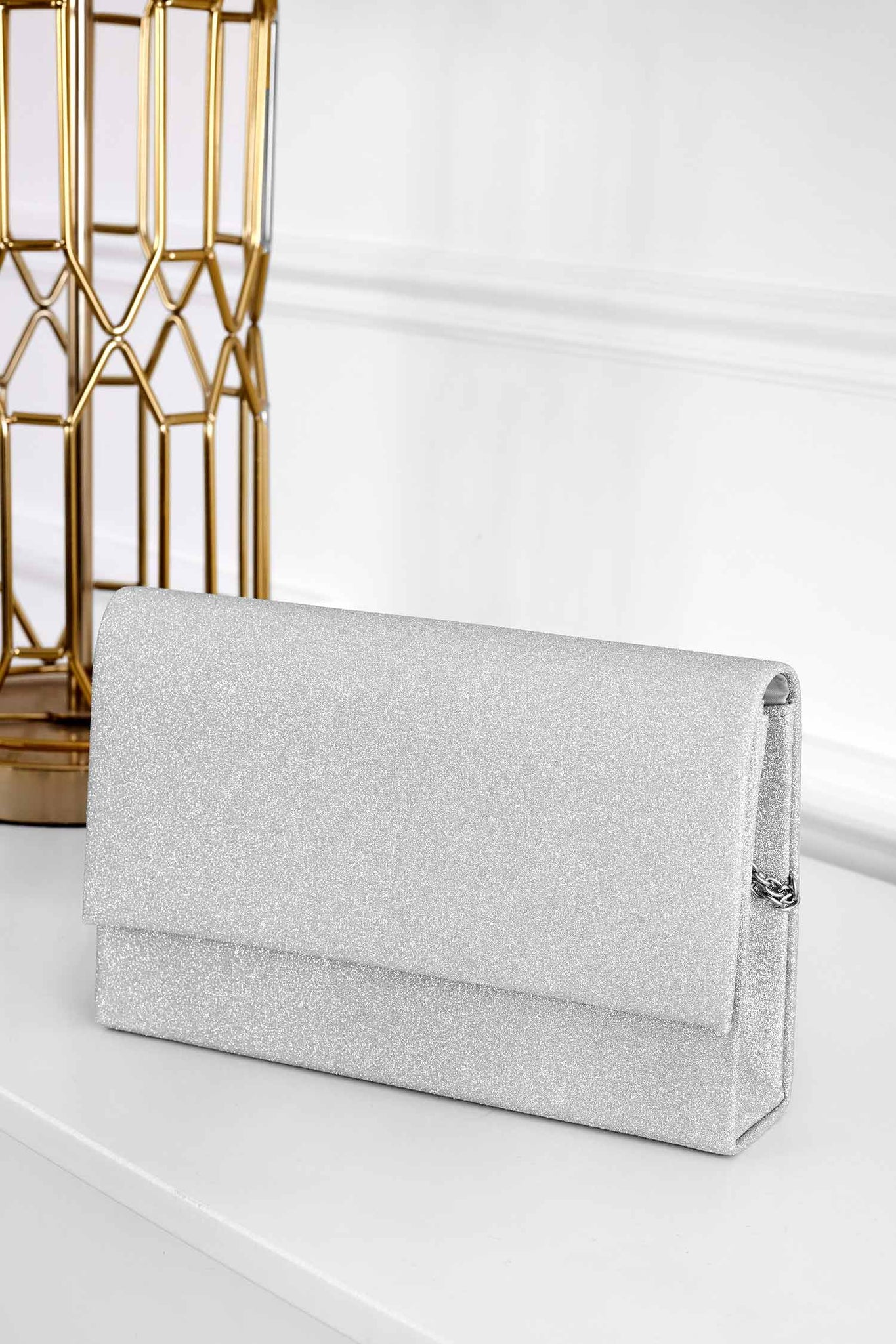 B218 silver clutch bag with glitter