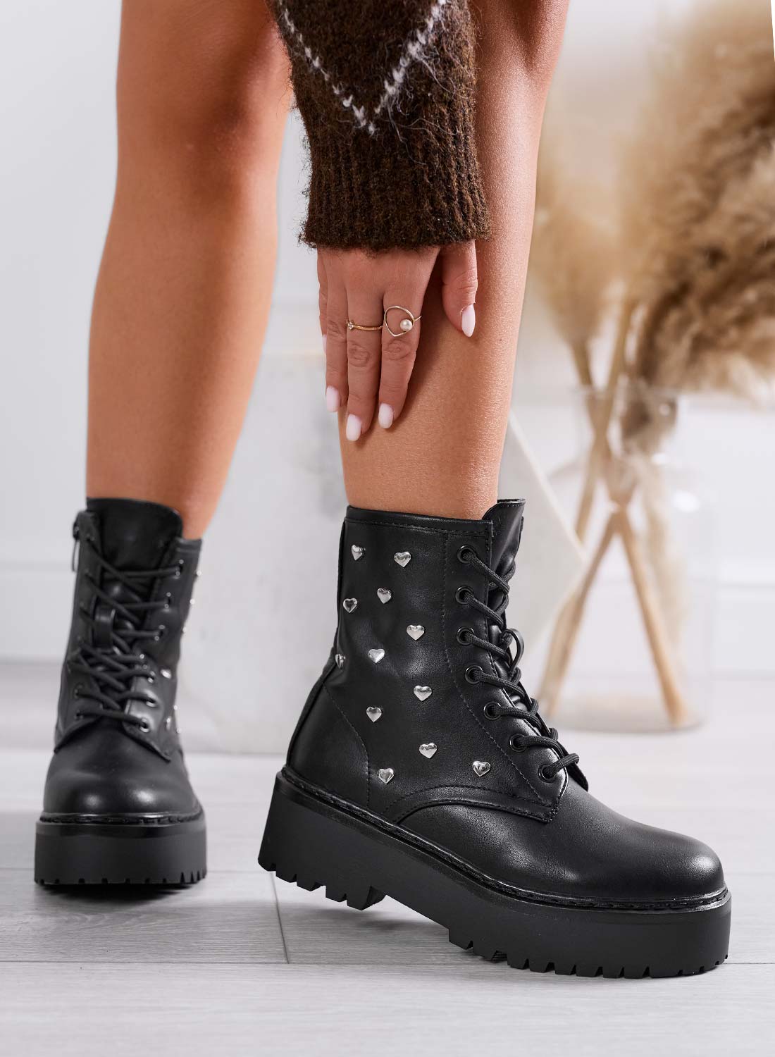 ODESSA - Black combat ankle boots by Alexoo with silver heart appliqués