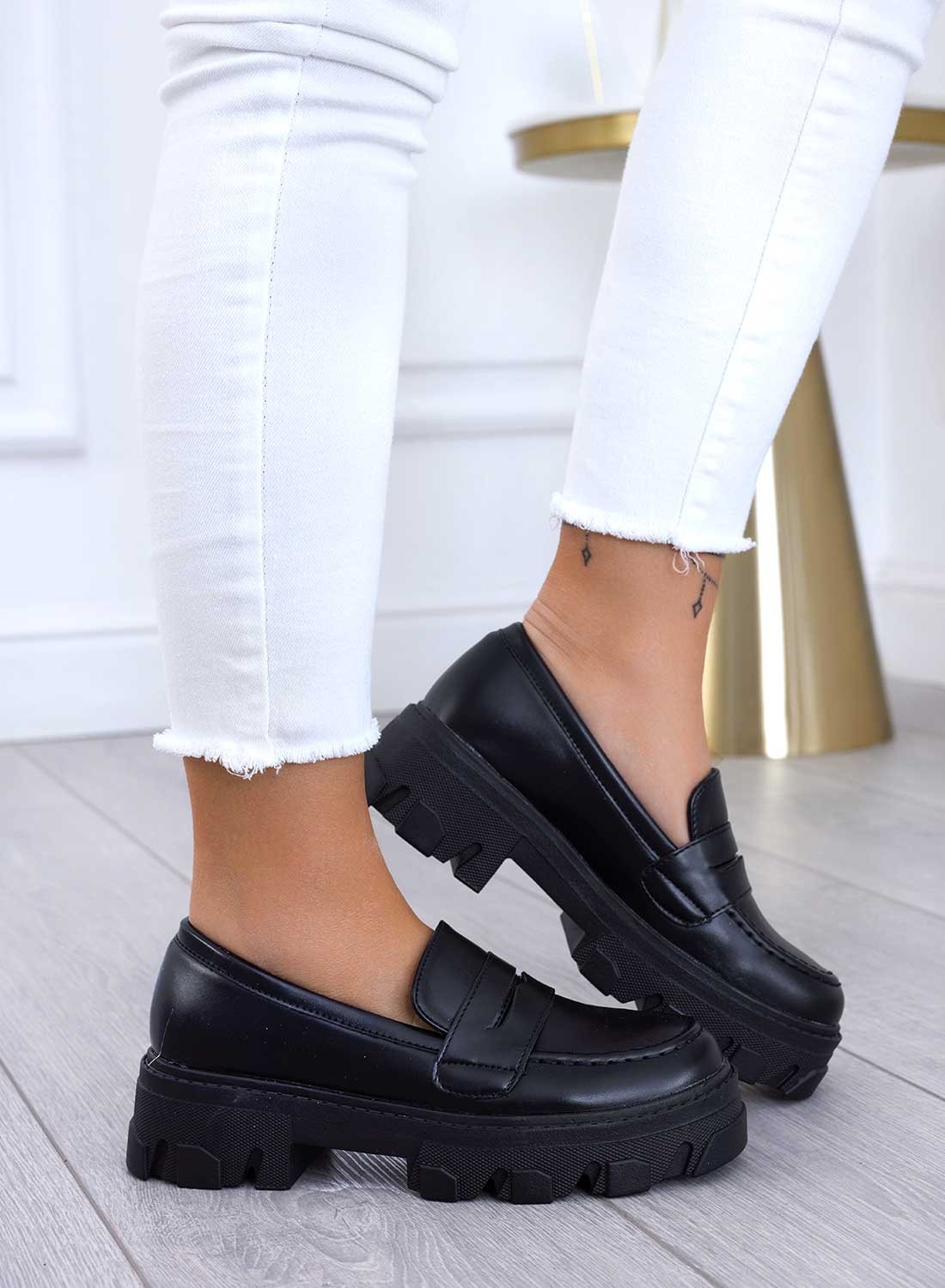 Black loafers with lug sole
