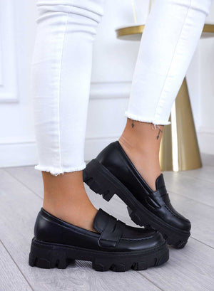 Black loafers with lug sole