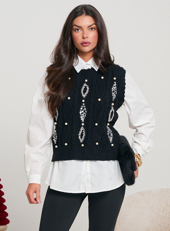 Pantaloni neri bootcut decorati con strass