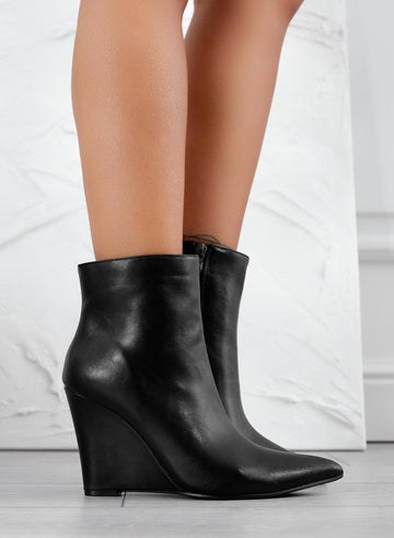 Black pointed wedge ankle boots