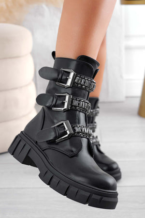Black biker ankle boots with buckles and studs