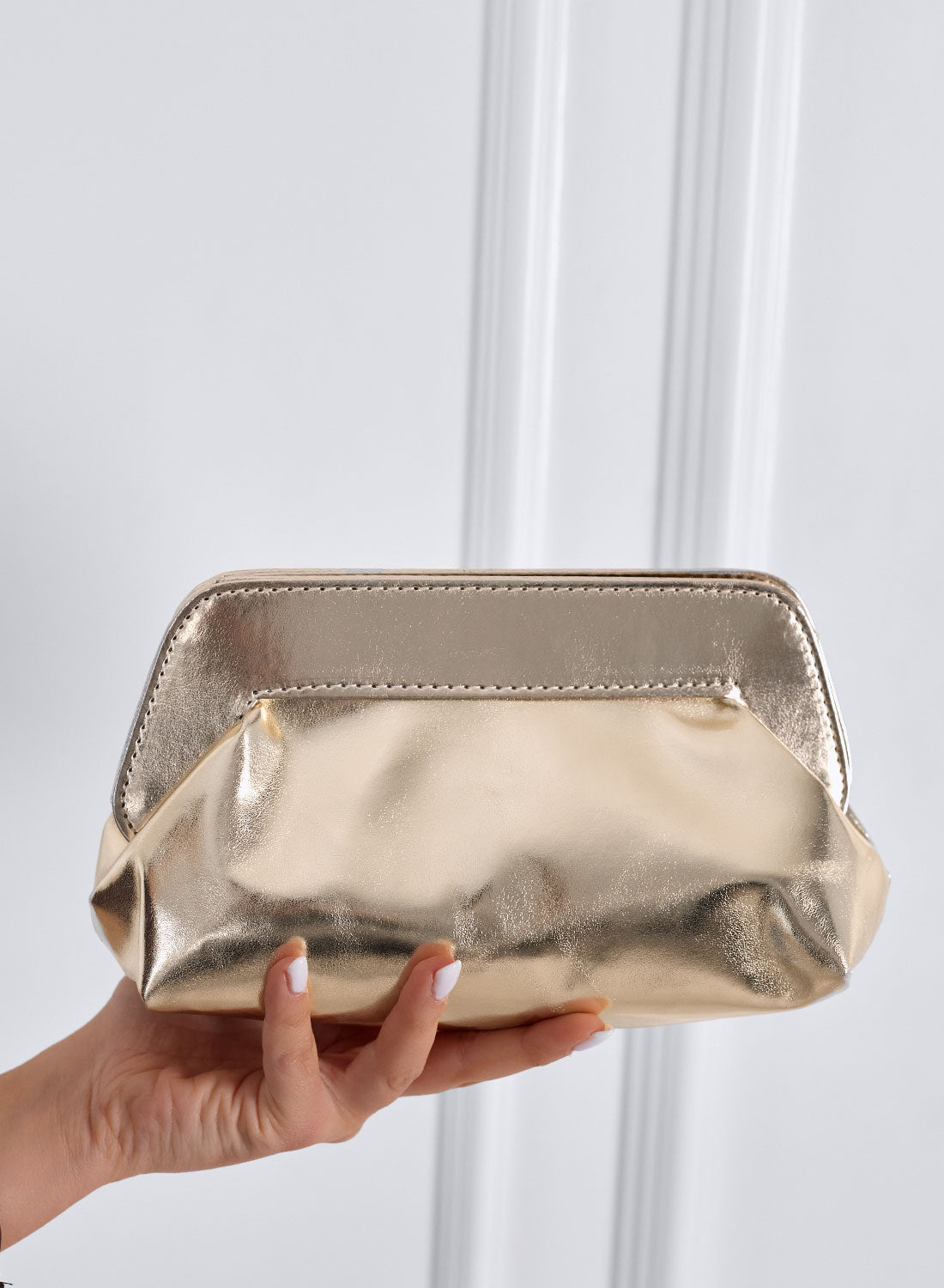 Gold eco-leather clutch bag with chain