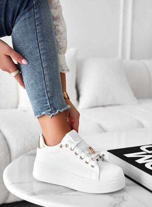 White sneakers with jewel appliqué and gold heel