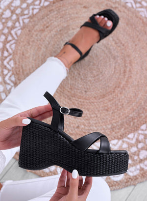 Black sandals with braided wedge and ankle strap