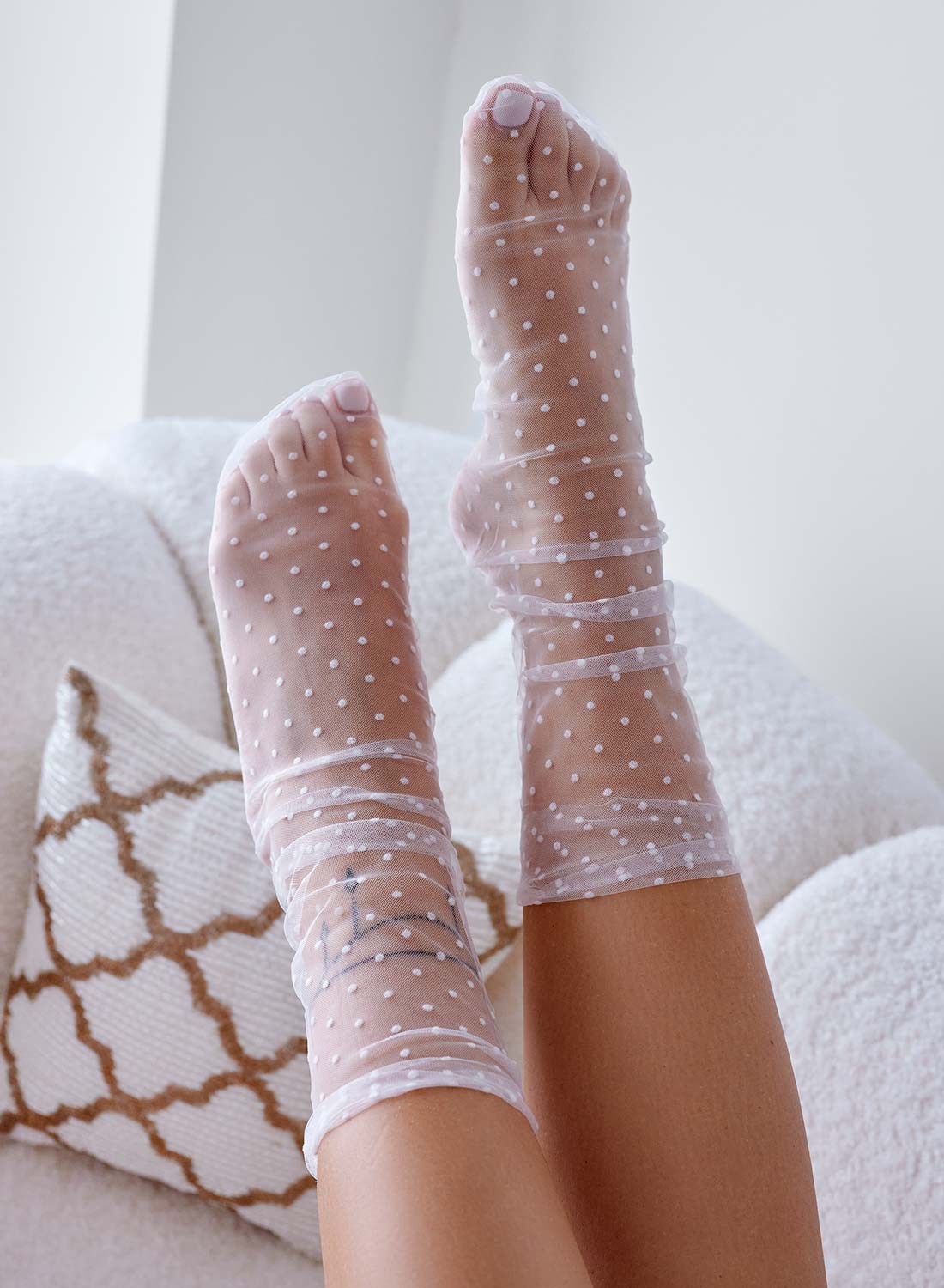 White sheer socks with mini polka dot pattern