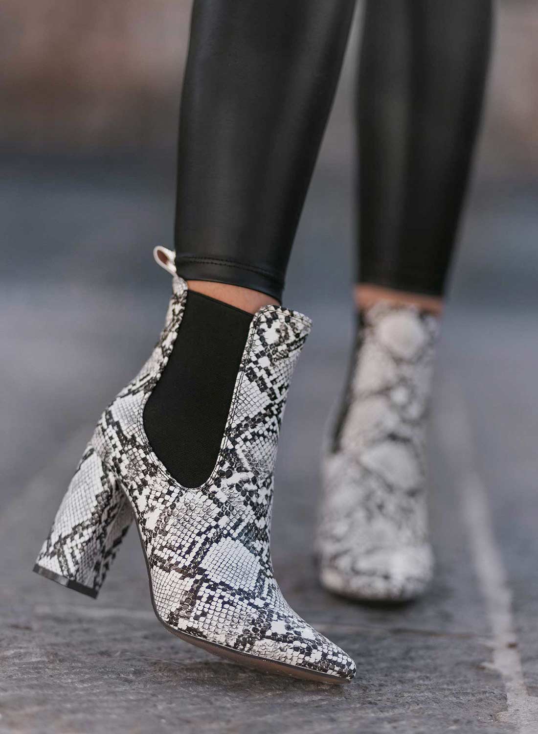 Black python-effect ankle boots by Alexoo with side elastic