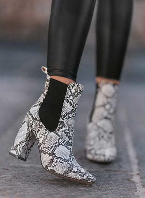 Black python-effect ankle boots by Alexoo with side elastic