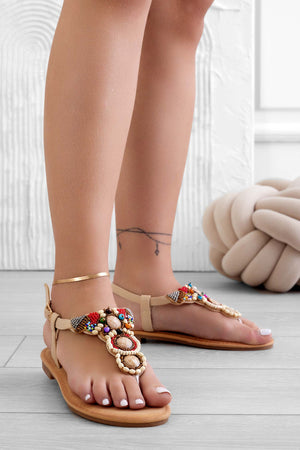 Beige flat thong sandals with multicolor stones