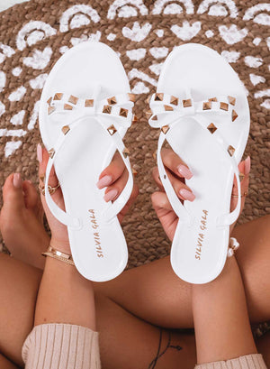 SAINT - White rubber beach flip-flops with gold studs