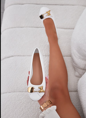 White ballet flats with gold teddy brooch