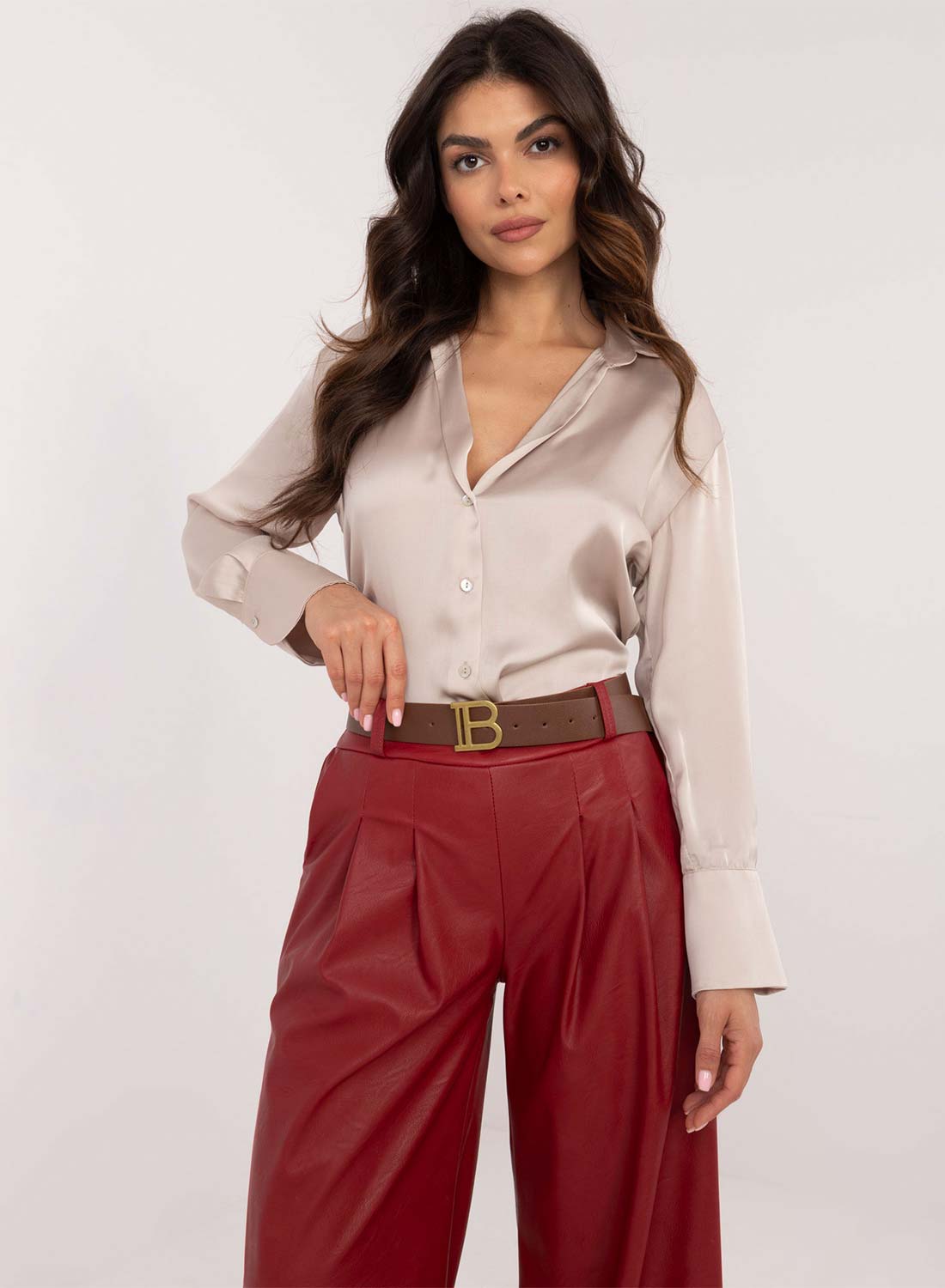 Burgundy faux leather flared trousers