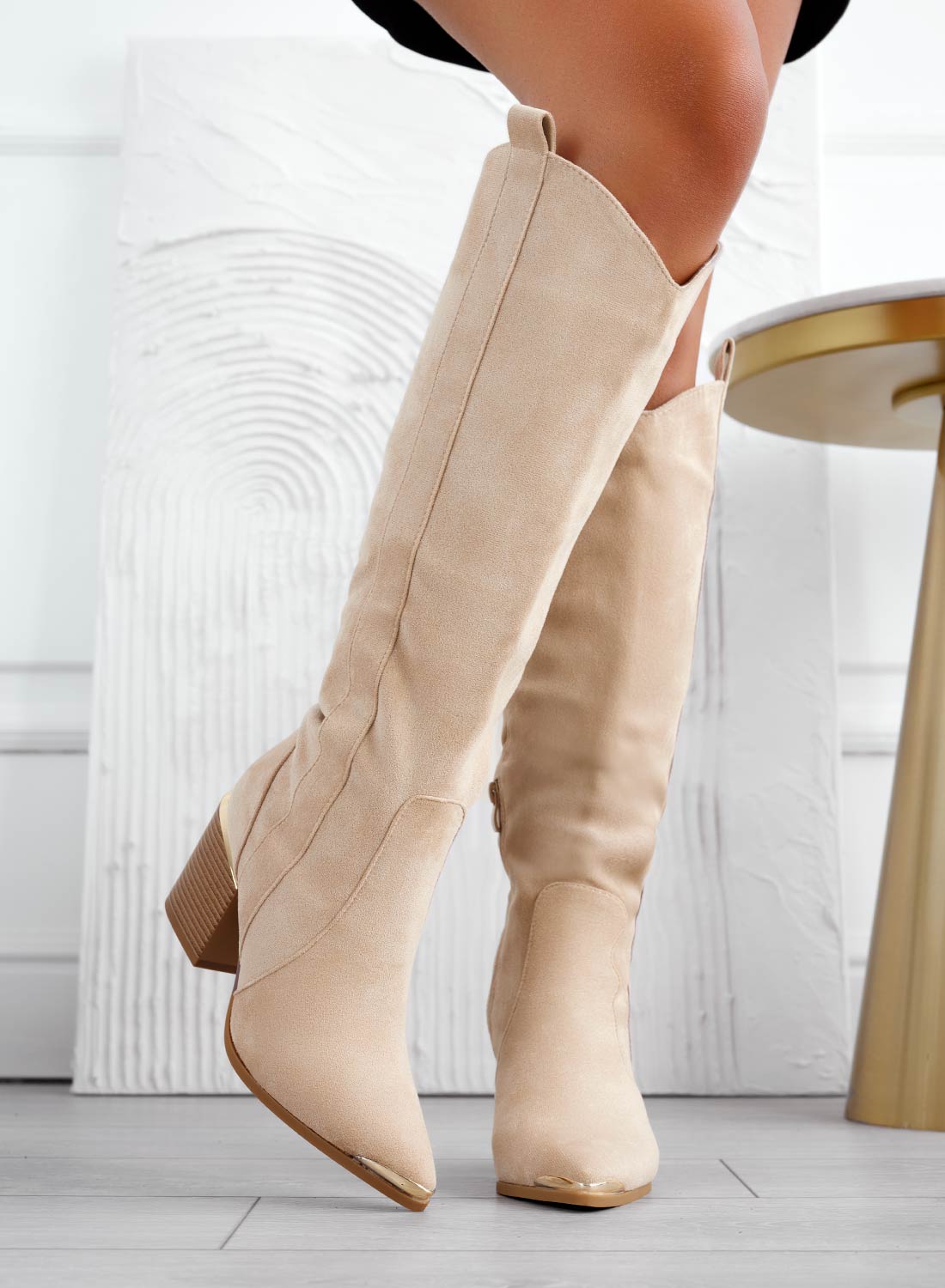 Beige camper boots with faux wood heel
