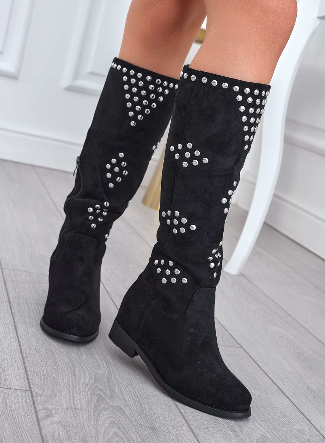 Black suede boots with studs
