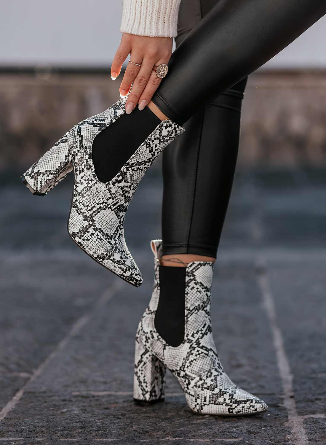 Black python-effect ankle boots by Alexoo with side elastic