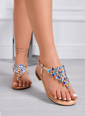 EDDIE - Low gold jeweled sandals with blue stones