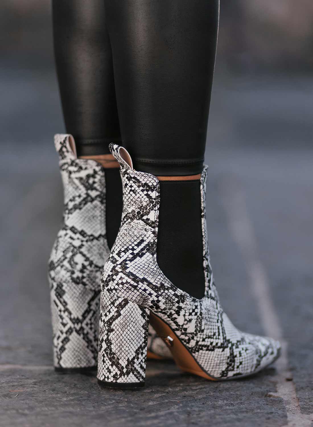 Black python-effect ankle boots by Alexoo with side elastic